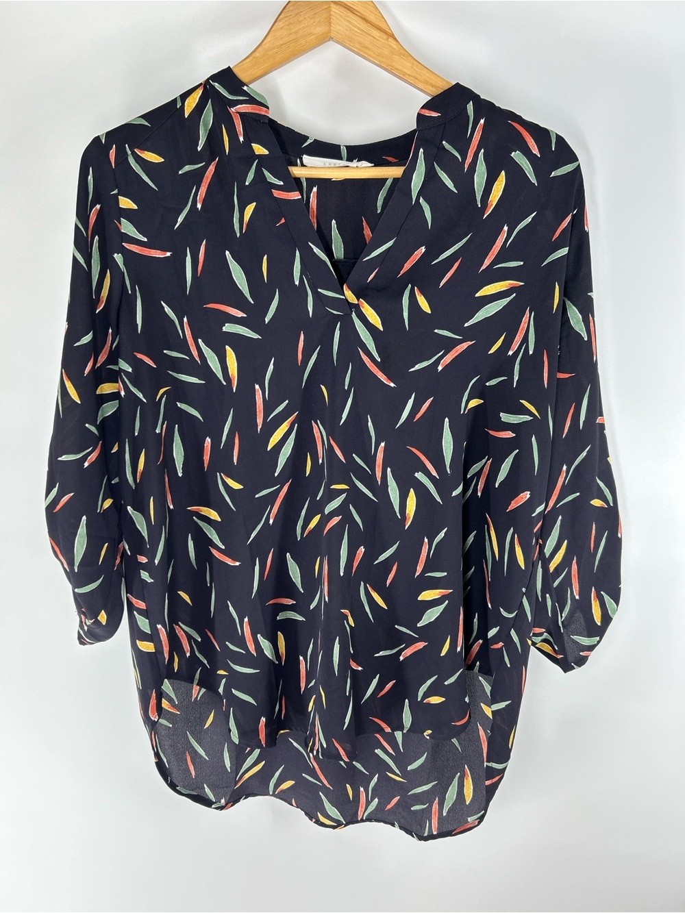 Lush Navy Blouse with Red, Yellow, and Green Leaf Print
